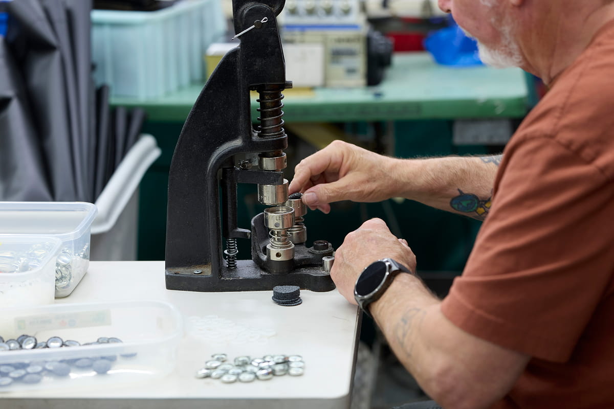 Industrial sewing machinery used for volume program production