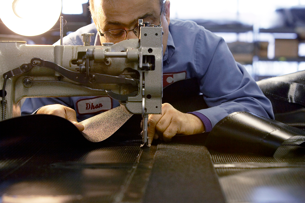 Contract cut and sew manufacturing line for high-volume client programs